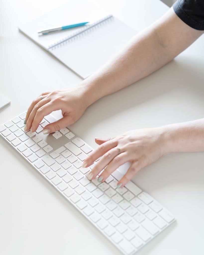 Close-up of hands typing